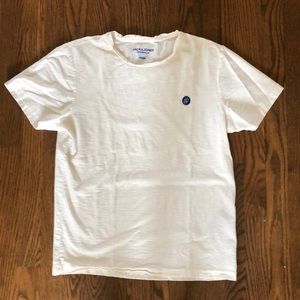 White sheer-ish crew neck top with blue logo